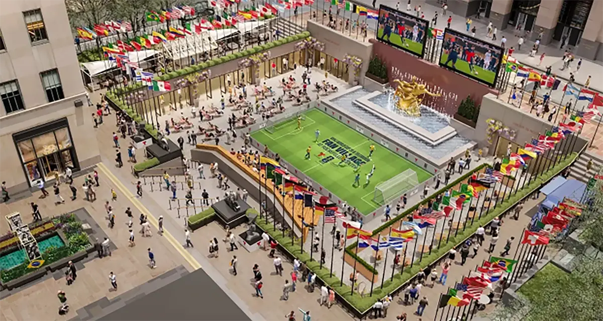 Aerial view of a FIFA World Cup Fan Zone with mini soccer pitch, championship trophy display, and international flag-lined plaza signage produced by Sign Centers.